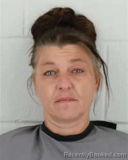 Mugshot of Sandra Elizabeth Panter-Calderon booked in Johnson County, Kansas on August 22, 2026