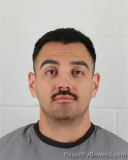 Mugshot of Marcos Moran booked in Johnson County, Kansas on August 23, 2026