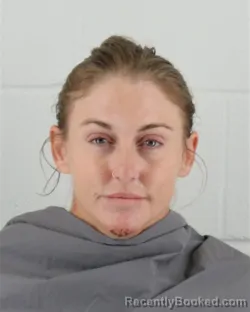 Mugshot of Elizabeth Jordon Sandhu booked in Johnson County, Kansas on August 24, 2026
