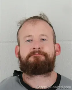 Mugshot of Justin Ryan Moyer booked in Johnson County, Kansas on August 28, 2026