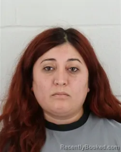 Mugshot of Esmeralda Cortez Valencia booked in Johnson County, Kansas on August 30, 2026