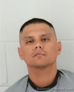 Mugshot of Cesar Alejandro Rosas booked in Johnson County, Kansas on August 30, 2026
