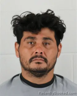 Mugshot of Carlos Mario Rodriguez-Mendoza booked in Johnson County, Kansas on August 31, 2026