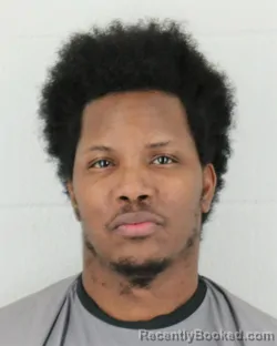 Mugshot of Hasani Michael Scott booked in Johnson County, Kansas on September 12, 2026