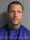 Mugshot of BRIAN ALAN MCKEIGHAN booked in Leavenworth County, Kansas on April 7, 2026