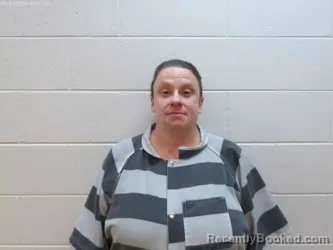 Mugshot of Holly Renee Hamm booked in Marion County, Kansas on April 14, 2026