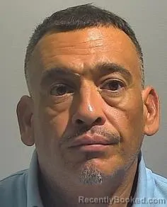 Mugshot of Carlos Ejan Cena booked in McPherson County, Kansas on October 27, 2026