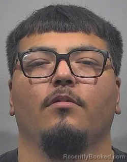 Mugshot of Devin Ernest Flores booked in McPherson County, Kansas on September 11, 2026
