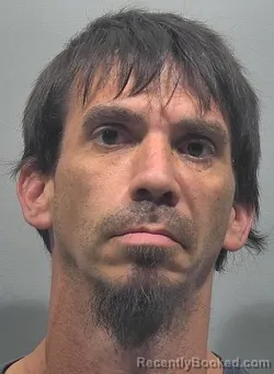Mugshot of Dennis Michael Oliveria booked in McPherson County, Kansas on May 2, 2026