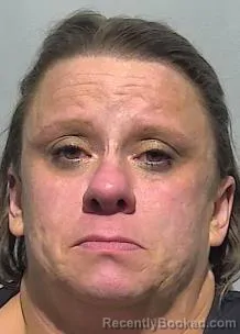 Mugshot of Holly Renee Hamm booked in McPherson County, Kansas on April 10, 2026