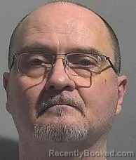 Mugshot of John Douglas Mistler booked in McPherson County, Kansas on October 7, 2026