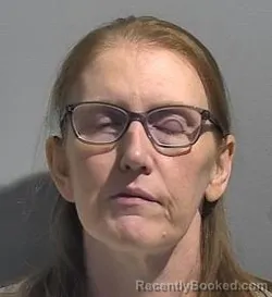 Mugshot of Sarah Hadleigh Mills booked in McPherson County, Kansas on October 4, 2026