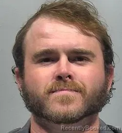 Mugshot of Travis John McDonald booked in McPherson County, Kansas on July 1, 2026