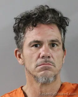 Mugshot of MARK WARNER