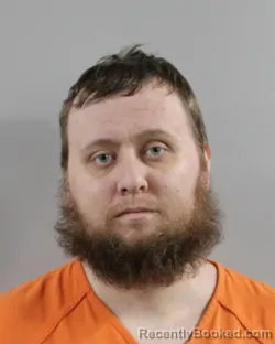 Mugshot of TYLER BENISTON
