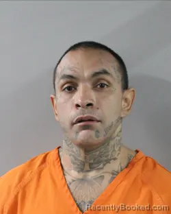 Mugshot of GILBERT GUZMAN