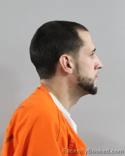 Mugshot of JUSTIN SMITH