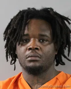 Mugshot of JACQURES MARTIN