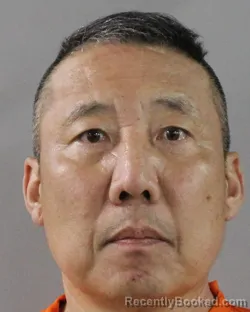 Mugshot of YINGZHE ZHANG booked in Polk County, Florida on March 12, 2026