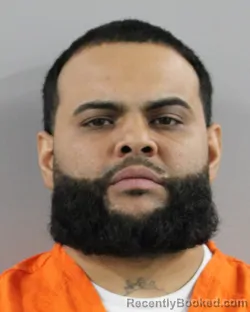 Mugshot of JOHNATON ROSARIO booked in Polk County, Florida on April 26, 2026