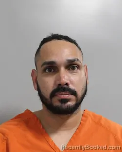 Mugshot of JONATHAN OMAR ORTIZ RAMOS booked in Polk County, Florida on May 14, 2026