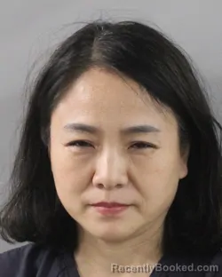 Mugshot of QIAOLI ZHANG booked in Polk County, Florida on June 22, 2026