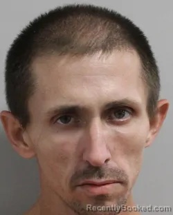 Mugshot of AARON POLLY booked in Polk County, Florida on June 22, 2026