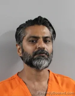 Mugshot of Mirza Baig booked in Polk County, Florida on July 15, 2026