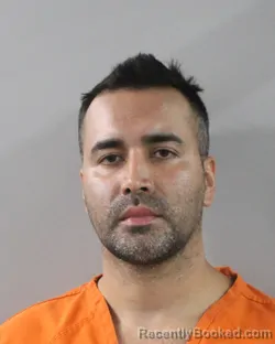 Mugshot of Miguel Melo Roa booked in Polk County, Florida on August 2, 2026