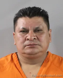 Mugshot of Juan Espinoza booked in Polk County, Florida on August 6, 2026
