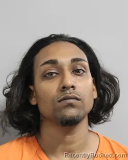 Mugshot of Christian Jodharam booked in Polk County, Florida on September 9, 2026