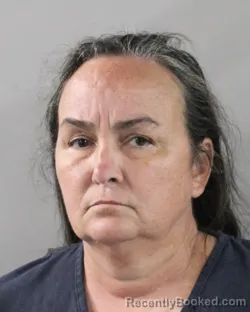 Mugshot of Crystal Rhodes booked in Polk County, Florida on October 21, 2026