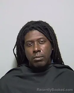 Mugshot of COWAN FONS AMAYE-OBU