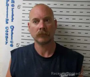 Mugshot of Ross Massie Mccue booked in Phillips County, Kansas on August 6, 2026