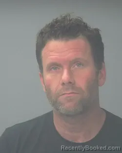 Booking photo from Santa Rosa County, Florida