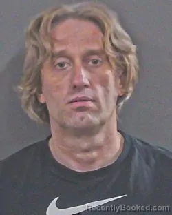Mugshot of DREW CHANDLER DENNIS