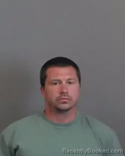 Mugshot of TRAVIS LEE HELMS