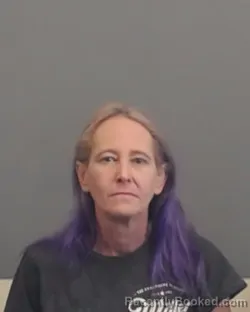 Mugshot of NANCY ELLEN STATHAM booked in Santa Rosa County, Florida on April 16, 2026