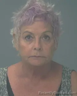 Mugshot of DEBRA ELIZABETH MAXWELL booked in Santa Rosa County, Florida on April 27, 2026