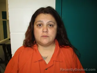 Mugshot of Corrinia Gonzalez Davis booked in Santa Rosa County, Florida on October 9, 2026