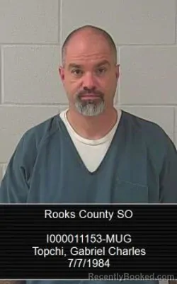 Mugshot of Gabriel Charles Topchi booked in Rooks County, Kansas on August 28, 2026