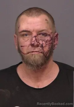 Booking photo from Saline County, Kansas