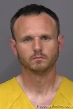 Mugshot of Nathan Matthew Augustine booked in Saline County, Kansas on March 25, 2026