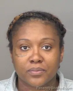 Mugshot of Courtney Lashay Vaughns booked in Saline County, Kansas on March 30, 2026