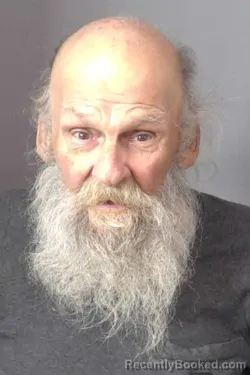 Mugshot of John William Reed booked in Saline County, Kansas on May 21, 2026