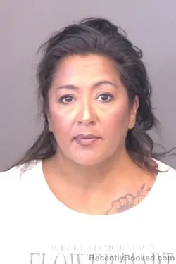 Mugshot of Monique Renee Calderon booked in Saline County, Kansas on August 19, 2026