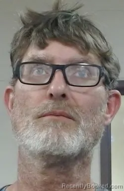 Mugshot of JASON SCOTT SCHNEIDER booked in Sedgwick County, Kansas on March 23, 2026