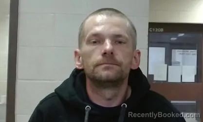 Mugshot of KYLE ANDREW RADOVICH booked in Sedgwick County, Kansas on March 22, 2026