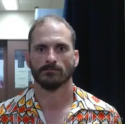 Mugshot of SAMMUEL LOGAN BROWN booked in Sedgwick County, Kansas on March 19, 2026