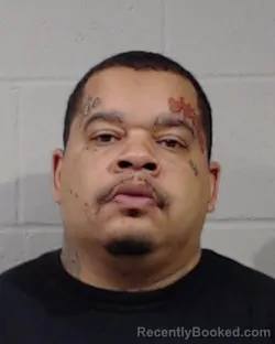 Mugshot of MARKETUS LAURICE REED booked in Sedgwick County, Kansas on March 26, 2026